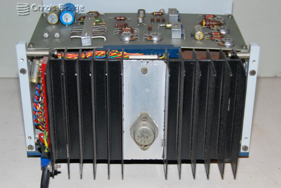 
    The D015-1.5 seen on the back, power transistor on heat sink.
    