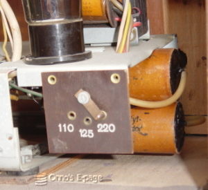 
    The two electrolytic capacitors, after restoration.
    